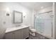 Contemporary bathroom with vanity, glass-enclosed shower, and elegant fixtures at 9179 Selborne Ln, Chattahoochee Hills, GA 30268