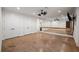 Exercise room with mirrored wall, wood ballet bar, and spacious open floor plan at 9179 Selborne Ln, Chattahoochee Hills, GA 30268