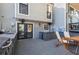 Outdoor deck with a built-in grill area and comfortable seating at 1028 Riverbend Club Se Dr, Atlanta, GA 30339