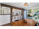 Cozy dining area with breakfast bar that connects to an open kitchen and deck at 1028 Riverbend Club Se Dr, Atlanta, GA 30339