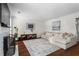 Spacious living room features stylish decor, a comfortable sectional, and ample natural light at 1028 Riverbend Club Se Dr, Atlanta, GA 30339