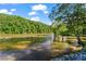 Beautiful river view with lush forest on sunny day at 1028 Riverbend Club Se Dr, Atlanta, GA 30339
