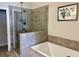 Modern bathroom featuring a soaking tub and glass-enclosed shower with elegant tile work at 2893 Elmwood Dr, Smyrna, GA 30080