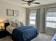 Comfortable bedroom with soft carpet, natural light, and neutral decor creating a peaceful retreat at 2893 Elmwood Dr, Smyrna, GA 30080