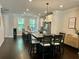 Spacious dining area seamlessly connected to a modern kitchen, perfect for entertaining and everyday living at 2893 Elmwood Dr, Smyrna, GA 30080