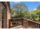 Wooden balcony featuring a view of the street and surrounding trees at 323 8Th Ne St # 7, Atlanta, GA 30309