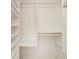 A well-organized walk-in closet with multiple shelves and hanging rods at 323 8Th Ne St # 7, Atlanta, GA 30309