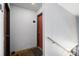 Interior hallway view with grey walls and two dark-colored doors with unit numbers at 323 8Th Ne St # 7, Atlanta, GA 30309