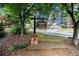 Midtown on 8th Condominiums sign on a tree-lined street at 323 8Th Ne St # 7, Atlanta, GA 30309