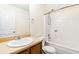 Traditional bathroom featuring a vanity, toilet, and tub with shower combination at 4065 Waters End Ln, Snellville, GA 30039