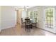 Cozy dining area with tile flooring, lots of sunlight, and backyard access at 4065 Waters End Ln, Snellville, GA 30039