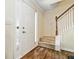Bright entryway with wood floors, white trim, and a staircase leading to the upper level at 4065 Waters End Ln, Snellville, GA 30039