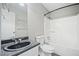 Bathroom with neutral paint, tub, and granite counters at 5590 Princeton Oaks Dr, Sugar Hill, GA 30518