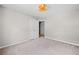 Bedroom with neutral carpet, paint, and an ensuite bathroom at 5590 Princeton Oaks Dr, Sugar Hill, GA 30518