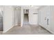 Entryway featuring wood-look flooring and a staircase leading to the upper level at 5590 Princeton Oaks Dr, Sugar Hill, GA 30518