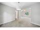 Open room showcases seamless flow to the living area, with a view to the backyard from the window at 5590 Princeton Oaks Dr, Sugar Hill, GA 30518