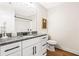 Well-lit bathroom featuring a granite countertop and modern fixtures at 208 Starr Cir, Stockbridge, GA 30281