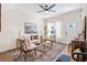 Comfortable living room with stylish furniture, wood floors, and ample natural light at 208 Starr Cir, Stockbridge, GA 30281