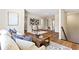 A living room with hardwood floors, neutral-toned furniture, and natural lighting at 208 Starr Cir, Stockbridge, GA 30281