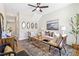 Inviting living room with vaulted ceiling, stylish furniture, and hardwood flooring at 208 Starr Cir, Stockbridge, GA 30281