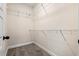 A walk-in closet with carpet and wired shelving at 208 Starr Cir, Stockbridge, GA 30281