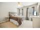 Cozy bedroom with carpet flooring, neutral colors, double windows and lots of natural light at 3915 Northridge Dr, Cumming, GA 30040