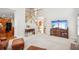 Bright living room with a staircase, large windows, and plenty of open space at 3915 Northridge Dr, Cumming, GA 30040