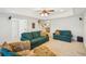 Spacious living room with plush carpeting, neutral walls, and an open floor plan at 3915 Northridge Dr, Cumming, GA 30040