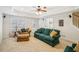 Inviting living room featuring plush carpeting, neutral walls, and comfortable furniture at 3915 Northridge Dr, Cumming, GA 30040