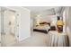 Spacious main bedroom with tray ceilings and sitting area leading to the ensuite bath at 3915 Northridge Dr, Cumming, GA 30040