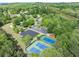 An aerial view of the community's amenities, including the pool, tennis courts, and playground at 420 Big Bend Trl, Sugar Hill, GA 30518