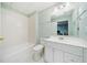 Bathroom featuring a tub-shower combo and a white vanity at 420 Big Bend Trl, Sugar Hill, GA 30518