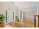 Bright foyer with hardwood floors, tall ceilings, and natural light at 420 Big Bend Trl, Sugar Hill, GA 30518
