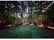 Private backyard with lush lawn and wooded backdrop, perfect for relaxing at 4531 Kings Lake Dr, Marietta, GA 30067