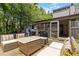 Backyard deck with cushioned outdoor seating, a wooden deck, and outdoor grills for summer cooking at 4531 Kings Lake Dr, Marietta, GA 30067