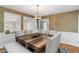 Bright dining room with chandelier, stylish wallpaper, and seating for six at 4531 Kings Lake Dr, Marietta, GA 30067