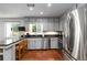 Bright kitchen featuring stainless steel appliances, modern cabinets, and outdoor view at 4531 Kings Lake Dr, Marietta, GA 30067