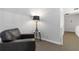 Cozy living space with a comfortable chair and decorative lamp at 4531 Kings Lake Dr, Marietta, GA 30067