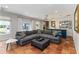 Open-concept living area with view into the kitchen, backyard views, and comfortable seating at 4531 Kings Lake Dr, Marietta, GA 30067