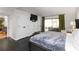 Comfortable main bedroom suite features modern décor, closet, and sliding glass doors to the patio at 4531 Kings Lake Dr, Marietta, GA 30067