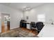 Bright home office with large desks, neutral paint, and two windows with natural light at 4531 Kings Lake Dr, Marietta, GA 30067