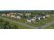 Expansive view of an upscale neighborhood featuring lush greenery and elegantly designed single-Gathering homes at 7504 Rivertown Rd, Fairburn, GA 30213