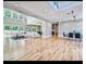 Spacious living room with large windows, hardwood floors, and modern decor at 7504 Rivertown Rd, Fairburn, GA 30213