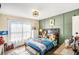 bedroom with natural light and a variety of toys and decorative items at 7760 Poppy Dr, Winston, GA 30187
