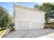 Spacious two-car garage with ample parking space and convenient access to the home at 7760 Poppy Dr, Winston, GA 30187