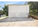 Two-car garage with extra parking space, offering secure storage and easy access at 7760 Poppy Dr, Winston, GA 30187