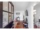 Bright entryway with hardwood floors, modern decor, and a view into other rooms at 1081 Longley Nw Ave, Atlanta, GA 30318