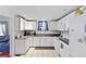 Traditional kitchen with white cabinets and appliances, offering a classic and functional space at 1081 Longley Nw Ave, Atlanta, GA 30318