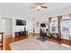 Bright living room features hardwood floors, ample natural light, and modern entertainment setup at 1081 Longley Nw Ave, Atlanta, GA 30318