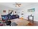 Spacious living room with hardwood floors, natural light, and view to the kitchen at 1081 Longley Nw Ave, Atlanta, GA 30318